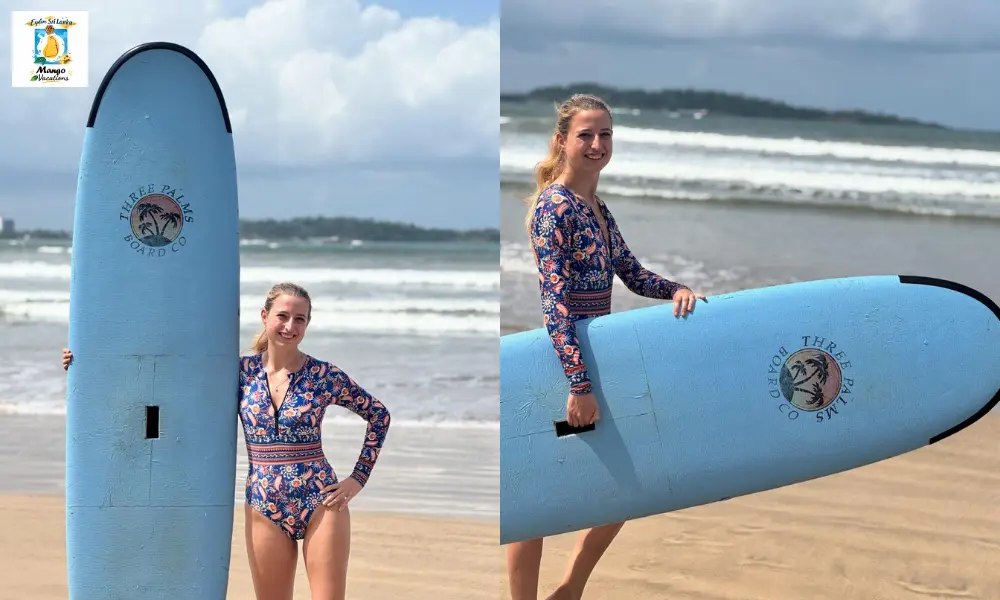 A traveler smiles on the sandy beach in Mirissa, Sri Lanka, posing with a blue surfboard before a surfing lesson, with gentle waves rolling in behind her under a bright tropical sky.